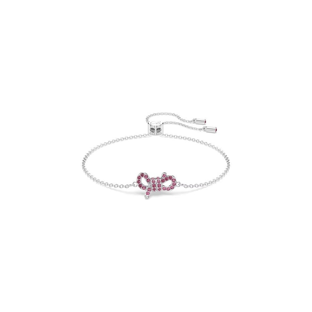 Elegant Swarovski bracelet featuring a delicate bow design with pink crystals, perfect for adding a touch of sparkle to any outfit.