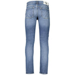 Back view of Calvin Klein blue slim taper jeans with five pockets, button and zip closure, featuring a logo and 20% recycled cotton.