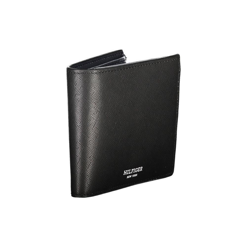 Tommy Hilfiger black leather wallet with compartments, coin purse, card slots, contrast detailing, and embossed logo.