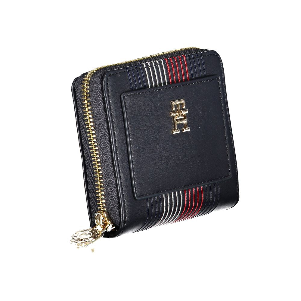 Tommy Hilfiger Blue Polyethylene Wallet with zip closure, contrasting details, and logo, featuring 1 external pocket and 4 compartments.