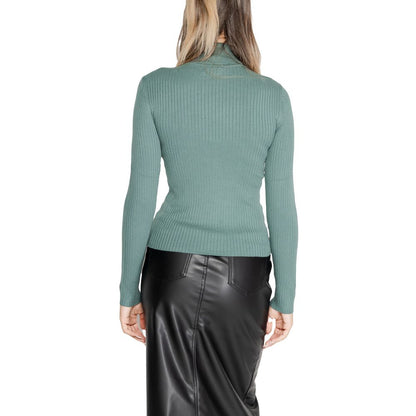 Back view of woman wearing Jacqueline De Yong Turquoise Viscose Sweatshirt with roll neck and long sleeves.