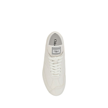 Top view of Chloé White Calf Leather Bos Taurus Low Top Sneakers with lace-up closure and iconic logo patch on tongue.
