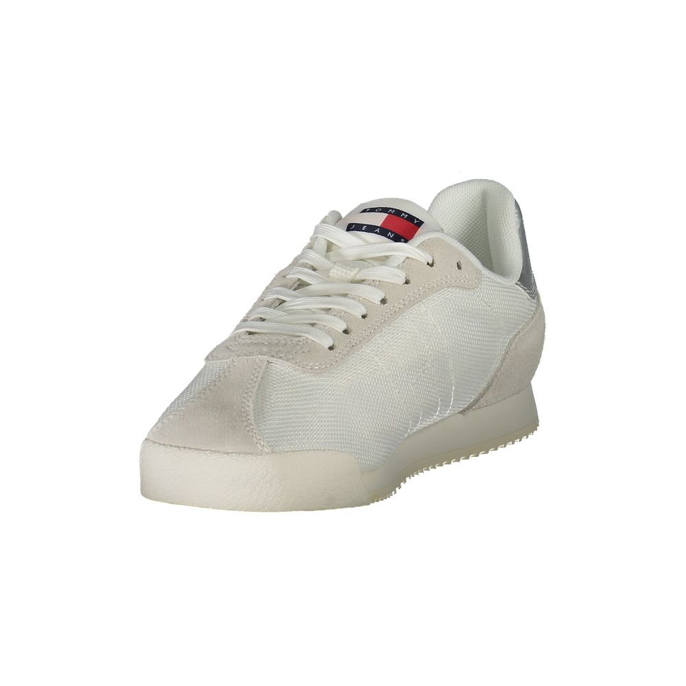 Tommy Hilfiger White Polyester Women Sneaker with recycled materials and bold logo, showcasing eco-friendly style and comfort.