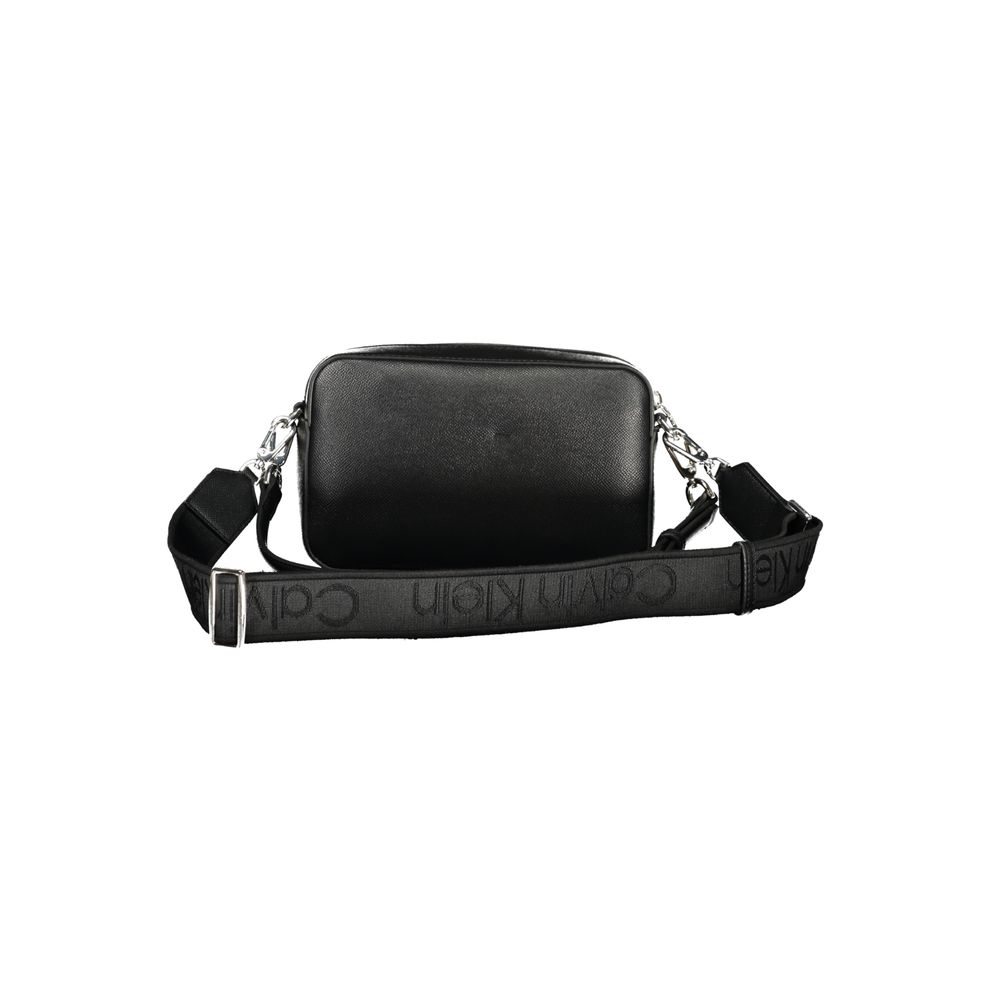 Calvin Klein Black Polyethylene Women Handbag with adjustable shoulder strap and zip closure, showcasing elegance and functionality.