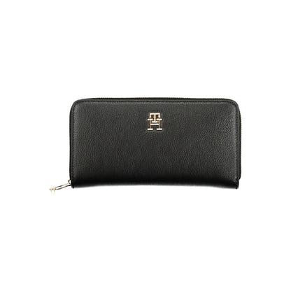 Tommy Hilfiger Black Polyethylene Women Wallet with iconic logo, compact design, and zip closure for secure style.