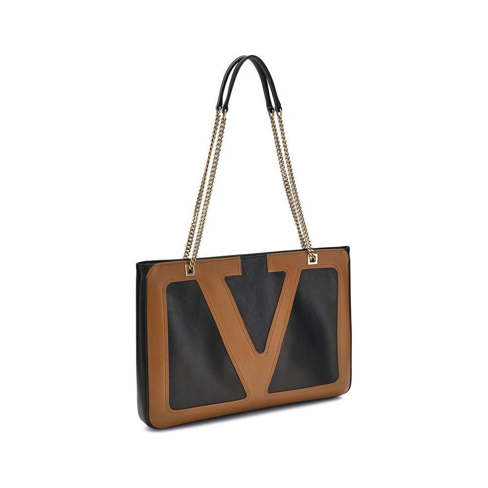 Front view with bag zipped and handles upright.