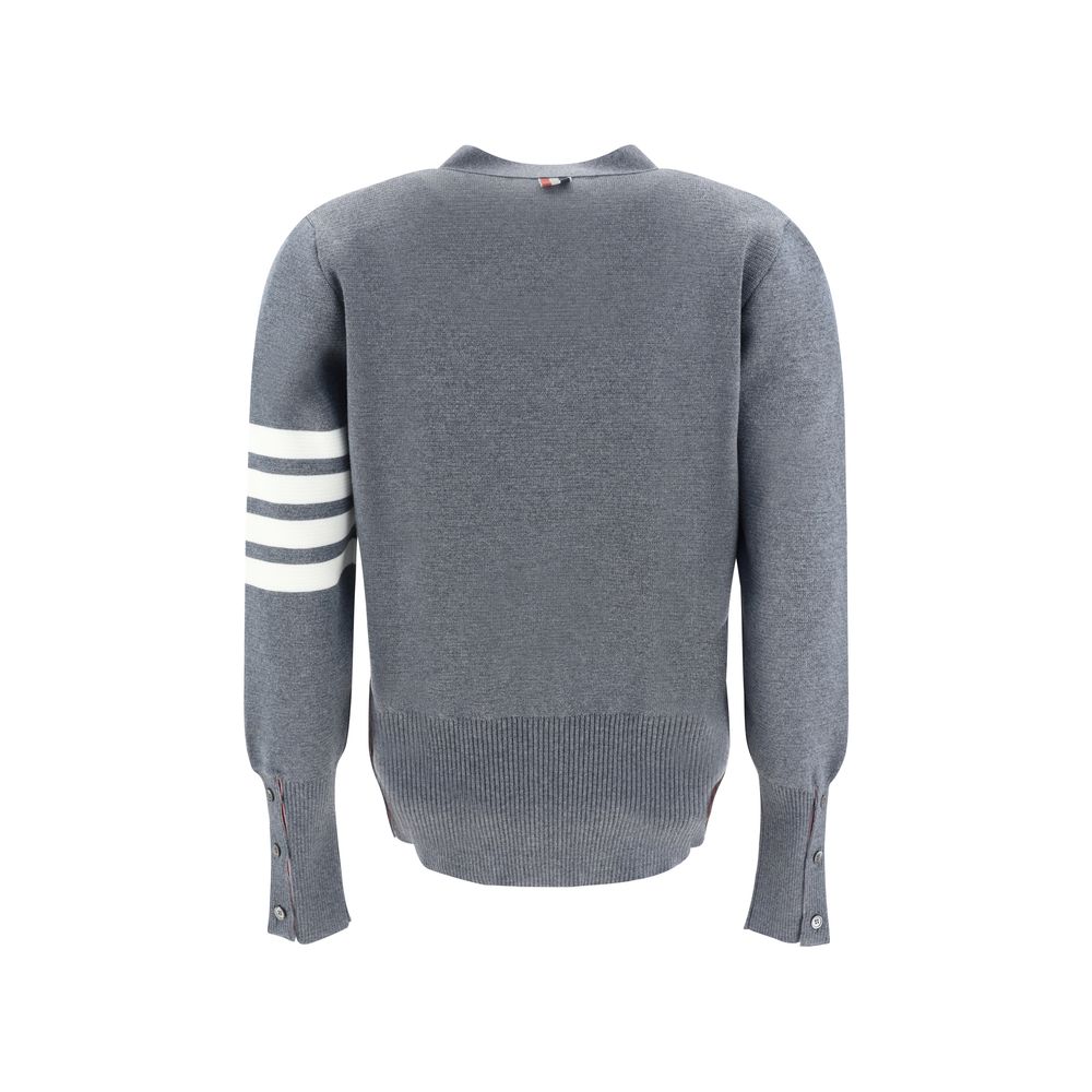 Back view of Thom Browne Gray Fleece Wool Cardigan with signature arm bands and buttons.