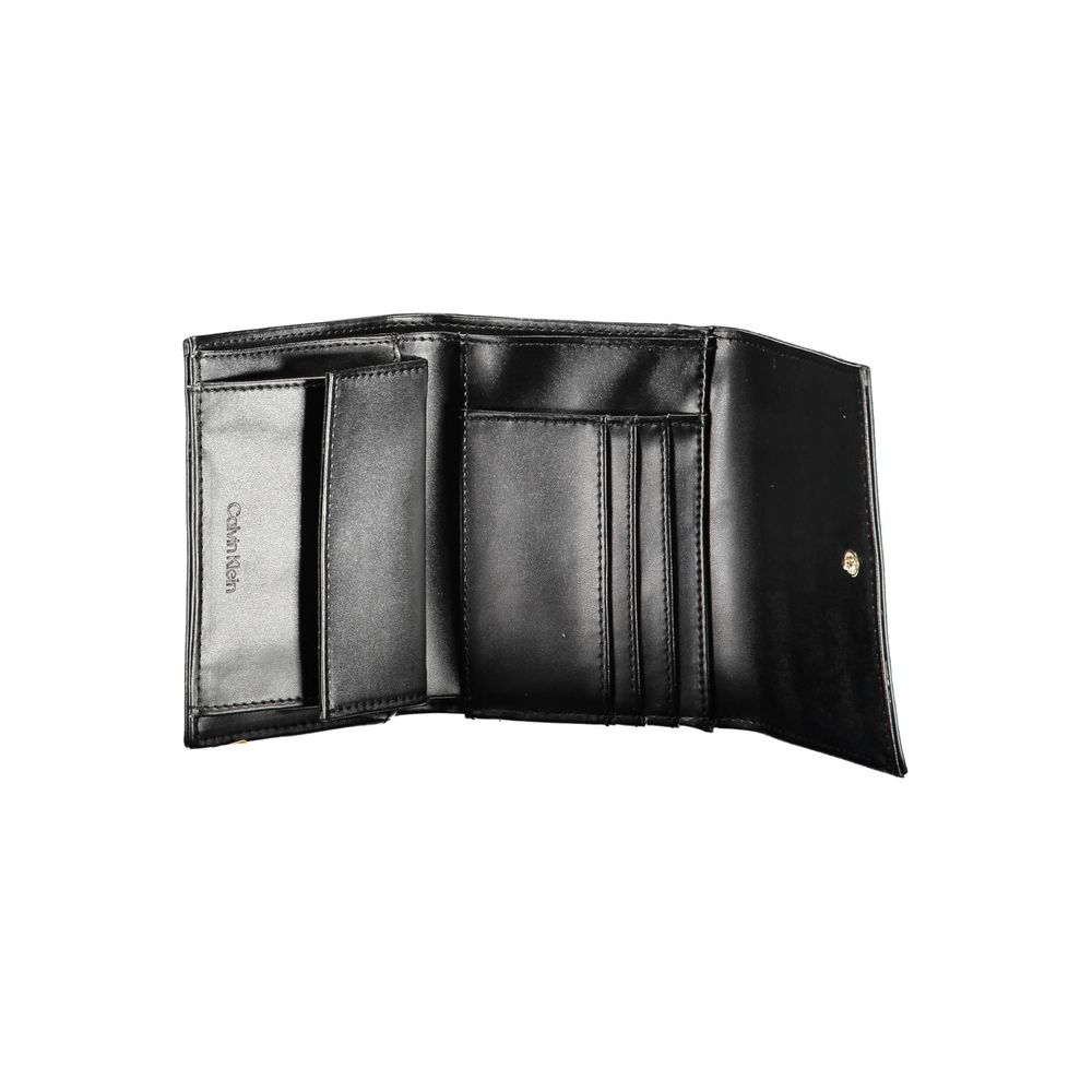 Calvin Klein Black Polyester Women Wallet open view showing multiple card slots and compartments for a stylish and functional accessory.