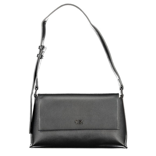 Calvin Klein Black Polyester Handbag with adjustable shoulder handle, internal pocket, snap closure, and logo.