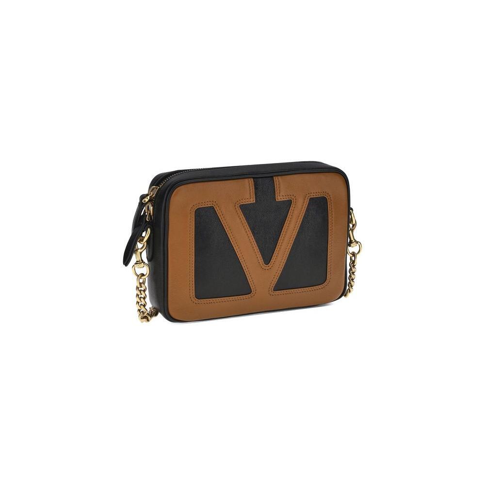 Front view with bag zipped and handles upright.
