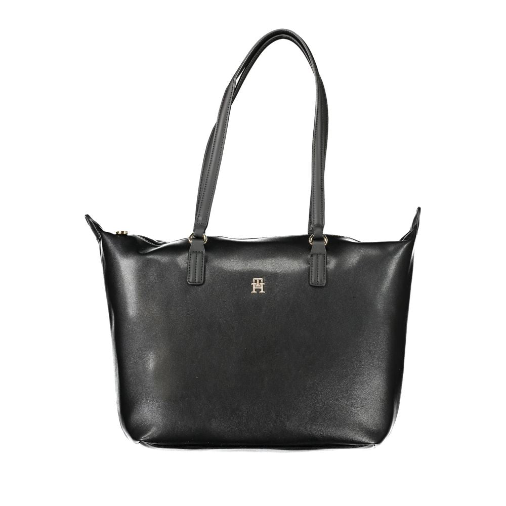 Front view with bag zipped and handles upright.