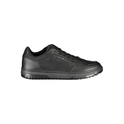 Tommy Hilfiger Black Leather Men Sneaker featuring sleek design and iconic logo for urban chic style and comfort.
