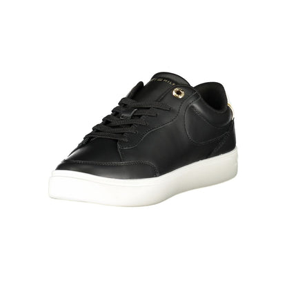 Tommy Hilfiger Black Leather Women Sneaker with bold contrast and iconic logo, perfect for fashion-forward individuals seeking chic casual style.