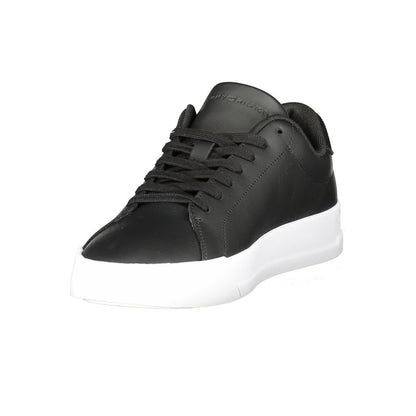 Tommy Hilfiger Black Leather Men Sneaker featuring sleek design and contrasting sole with logo.