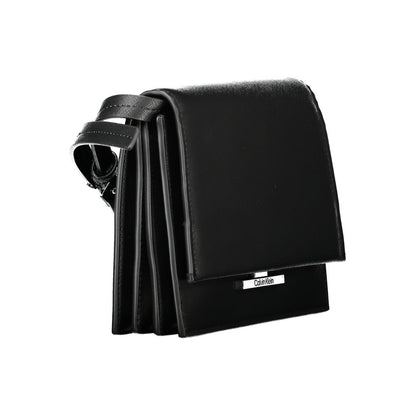 Calvin Klein Black Polyethylene Handbag with adjustable shoulder strap, 3 compartments, internal pocket, and snap closure.