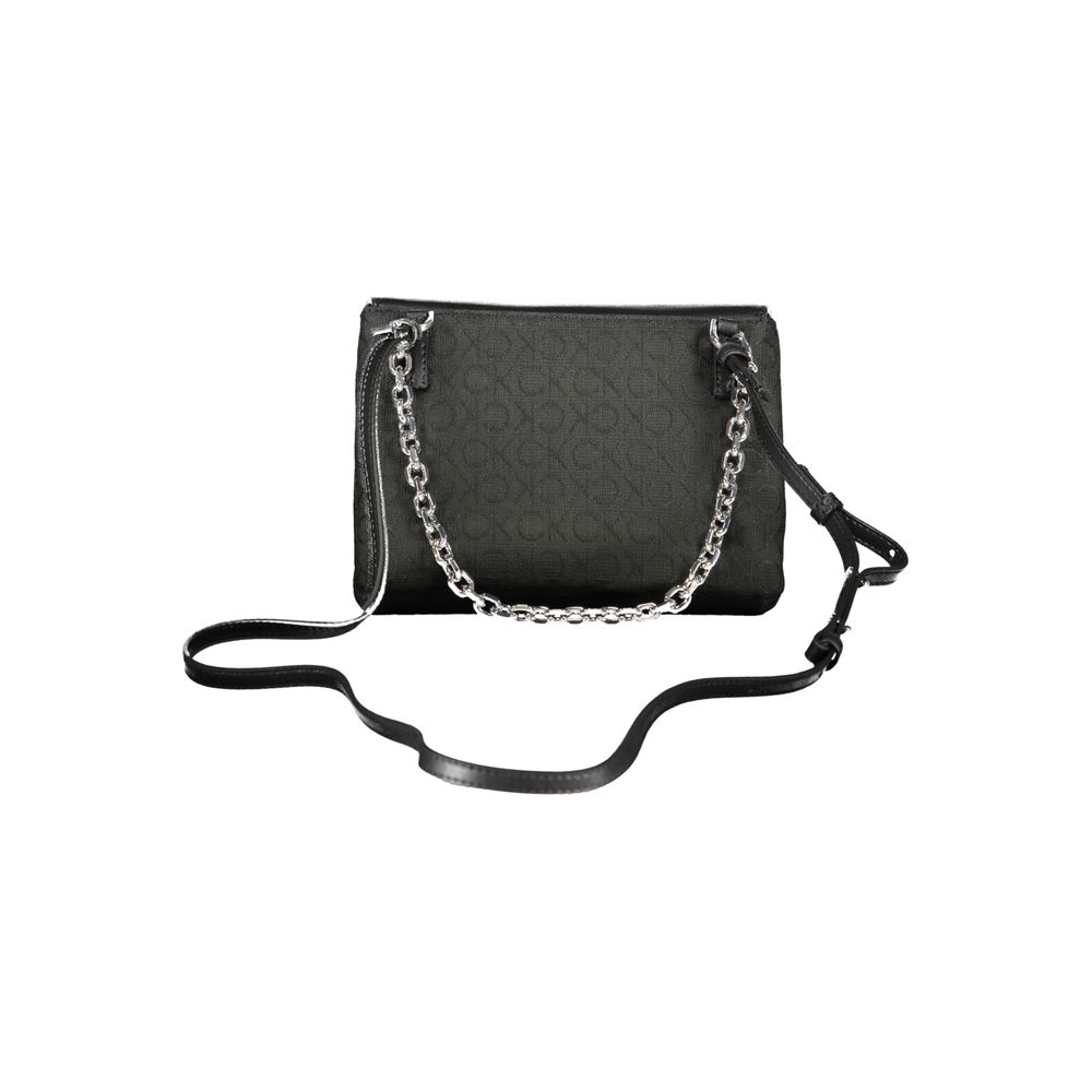 Calvin Klein Black Polyester Handbag with chain handle, adjustable strap, two compartments, turn closure, and logo design.