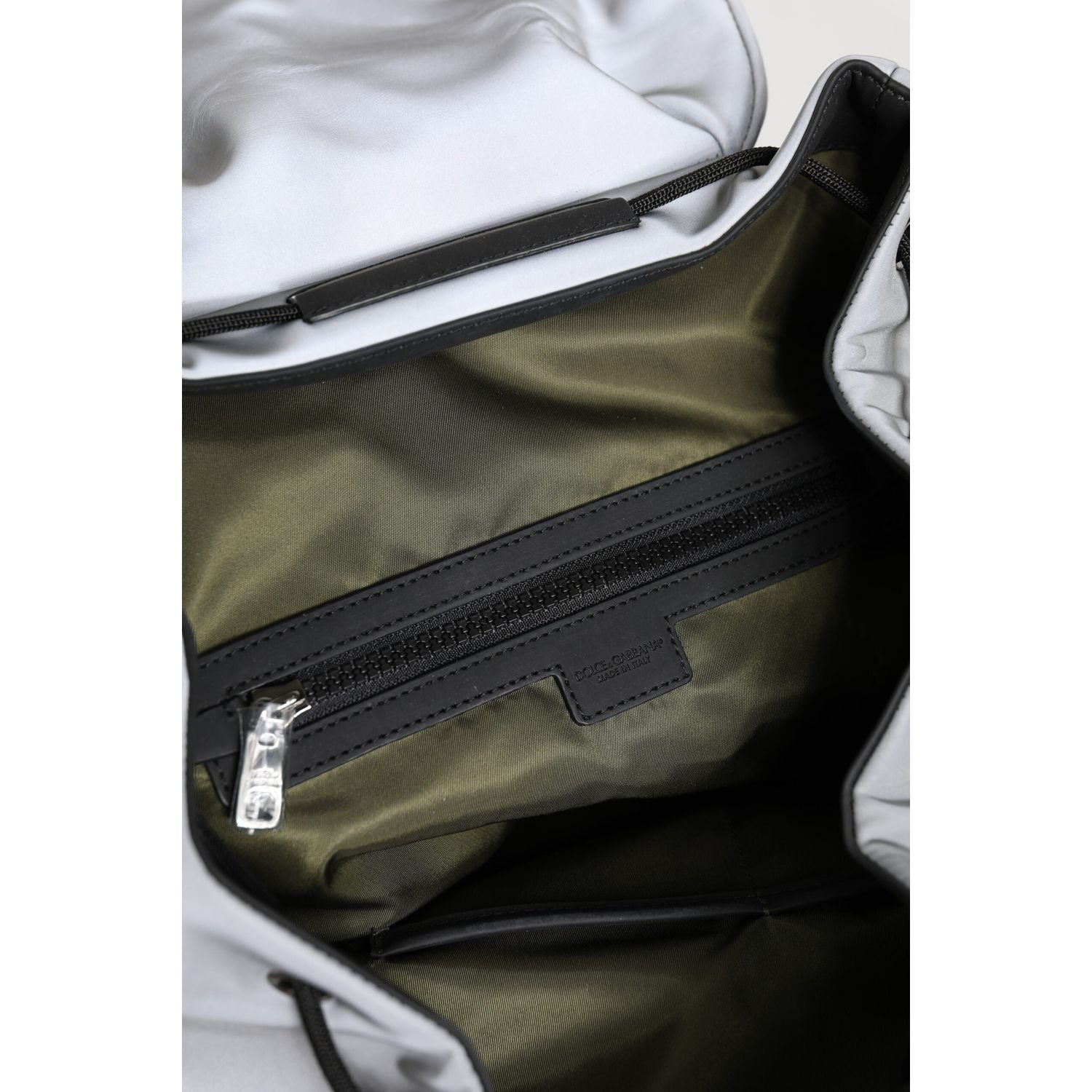 Front view with bag zipped and handles upright.