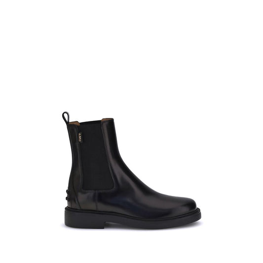 Tod's Black Calf Leather Bos Taurus Chelsea Boots with elastic inserts and rubber sole featuring embossed pebbles for comfort and grip.