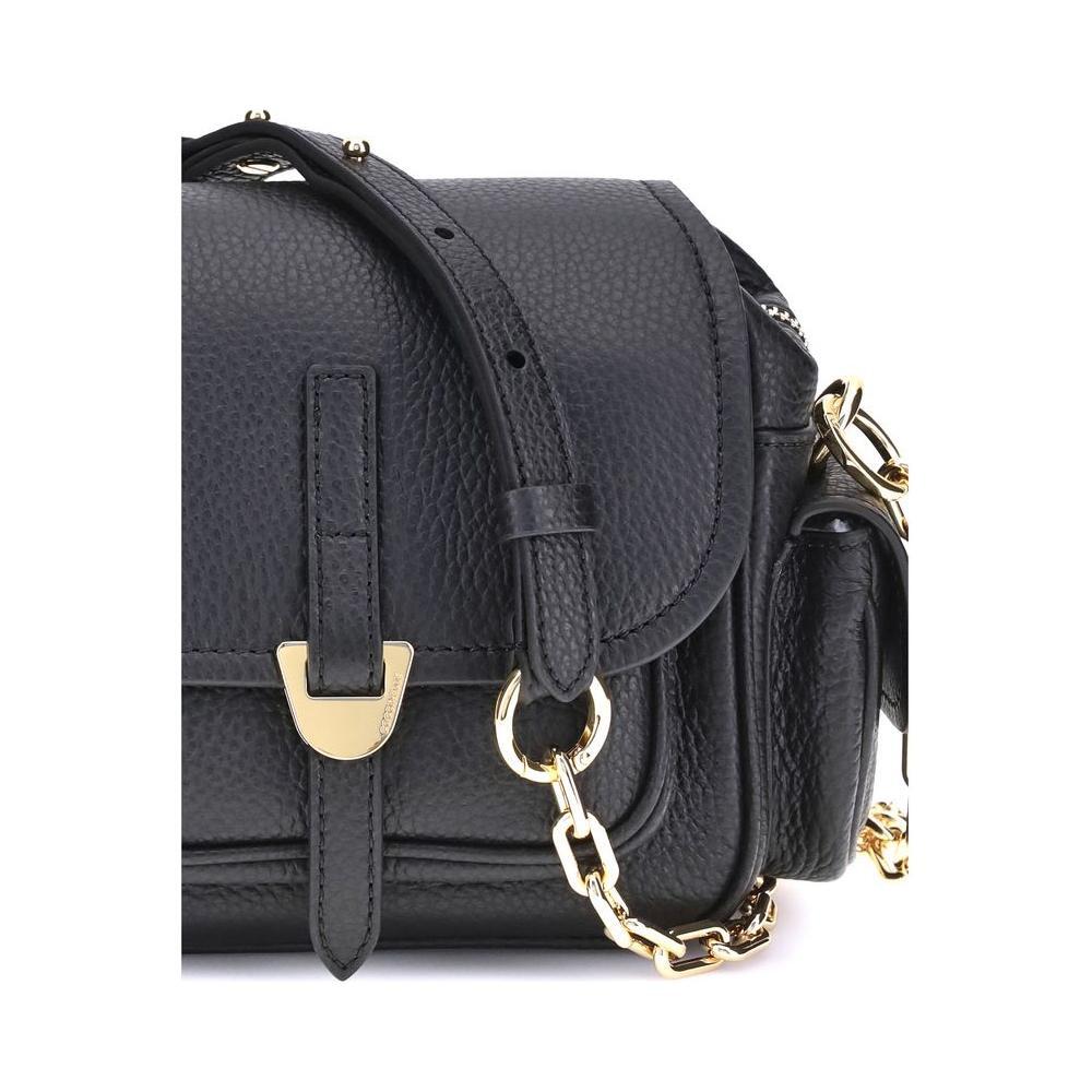 Front view with bag zipped and handles upright.