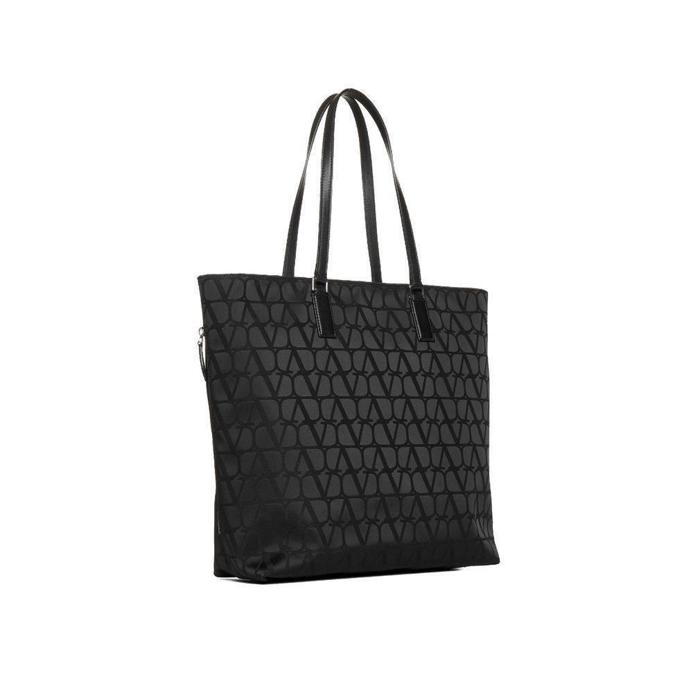 Front view with bag zipped and handles upright.