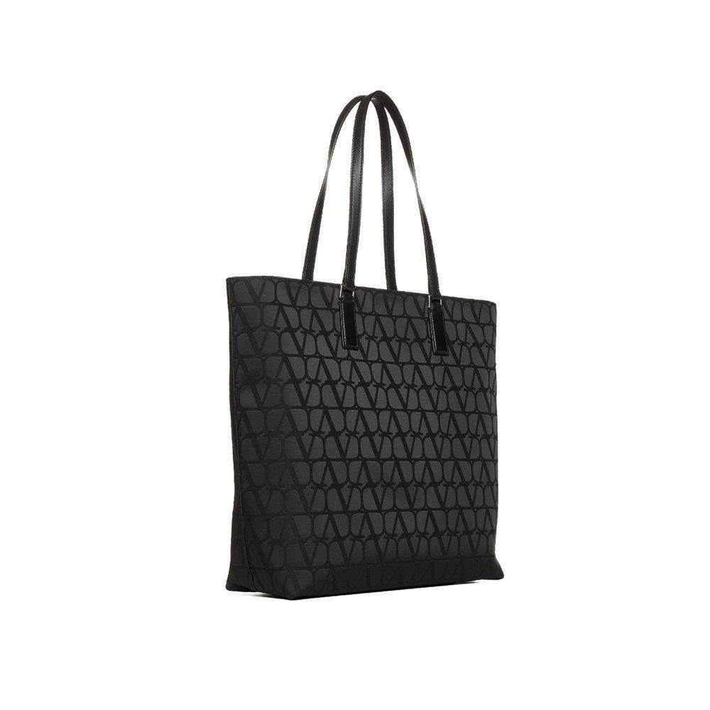 Front view with bag zipped and handles upright.