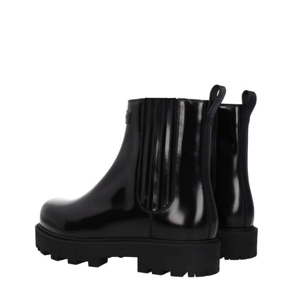 Givenchy Black Leather Ankle Boots with logos, rubber sole, and mid heels, style BH7016H1LQ001, casual round toe design.