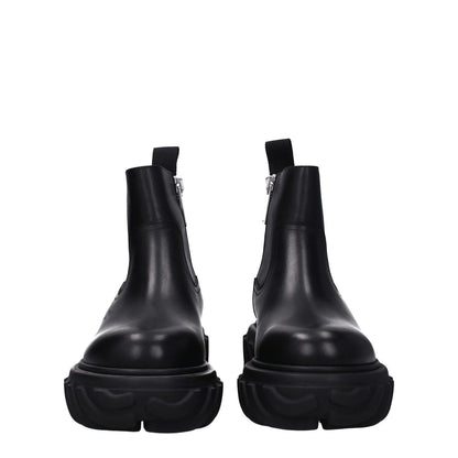 Front view of Off-White Black Leather Ankle Boots featuring zip closure and rubber sole.