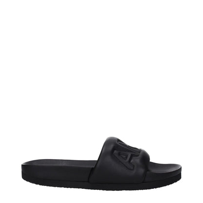 Ambush Black Leather Slippers with front logo, open toe, and rubber sole. Stylish street design, MPN BMIC001LEA0011000.