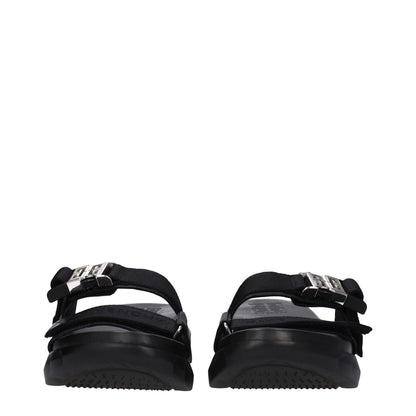 Front view of Givenchy Black Fabric Slippers with silver clips closure and rubber sole.