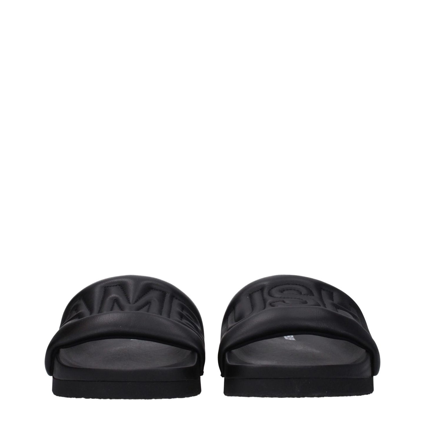 Front view of Ambush Black Leather Slippers with logo, open toe design, and rubber sole.