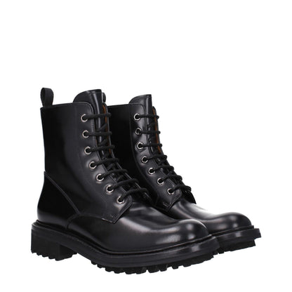 Church's Black Leather Ankle Boots with lace-up closure, vintage effect, and round toe design. Casual style with rubber sole.