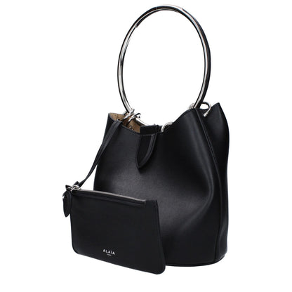 Alaïa Black Leather Handbag with removable inner clutch and front logo, featuring distressed areas and magnetic closure.