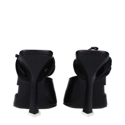 Rear view of The Attico Black Leather Stiletto Heel Sandals with 10.5 cm high heel and pointy toe, lace-up design.