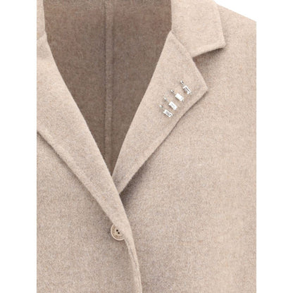 Close-up of Ermanno Scervino Beige Wool Coat showing lapel with rhinestone pins and button closure.