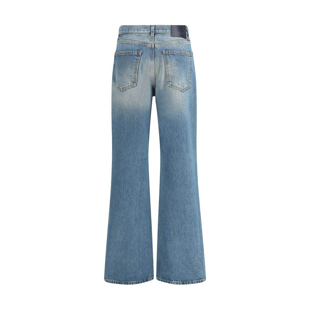 Back view of Haikure Light Blue Cotton Flared Jeans with logoed leather patch, wide-leg design, and five-pocket style.