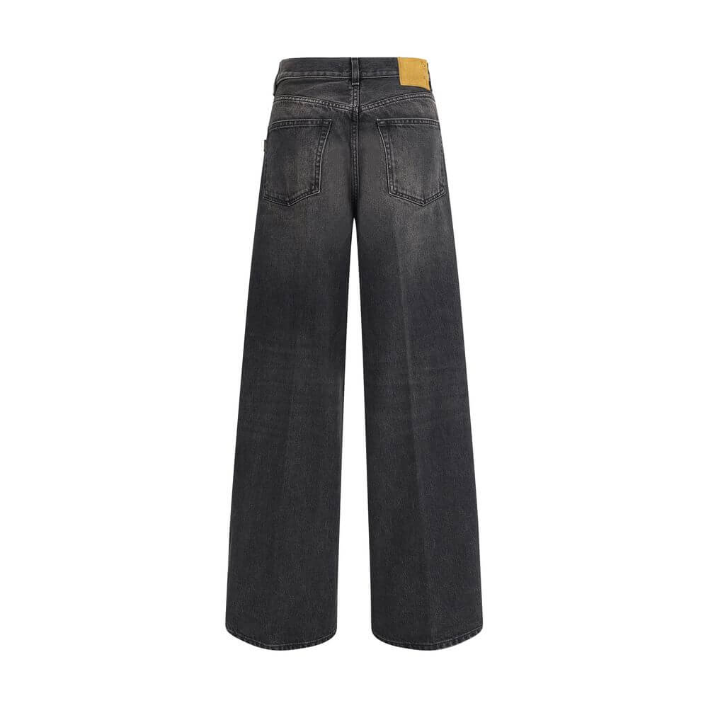 Rear view of Haikure Black Cotton Relaxed Fit Jeans with wide legs and logoed leather patch.