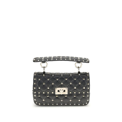Valentino Garavani Black Calf Leather Bos Taurus Handbag with studded shoulder strap and chic rockstud design.