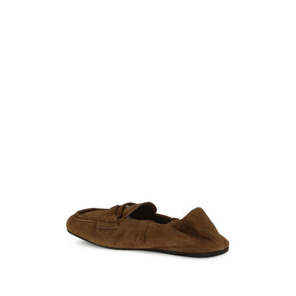 Miu Miu Brown Calf Leather Bos Taurus Slip-On Loafers with horsebit embellishment, suede material, for stylish comfort.