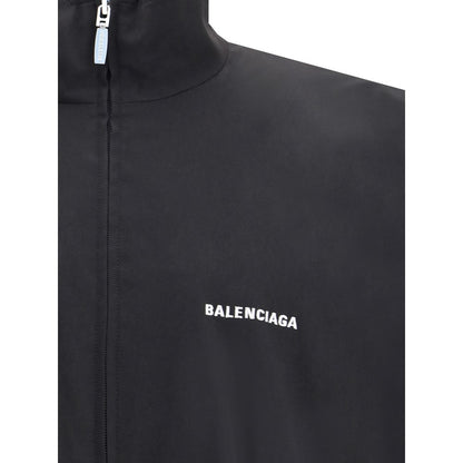 Balenciaga Black Polyester Shell Jacket with embroidered logo, high collar, and front zipper detail.