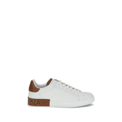 Dolce & Gabbana White Calf Leather Bos Taurus Low Top Sneakers with heel detail and logo stripe on a white background.
