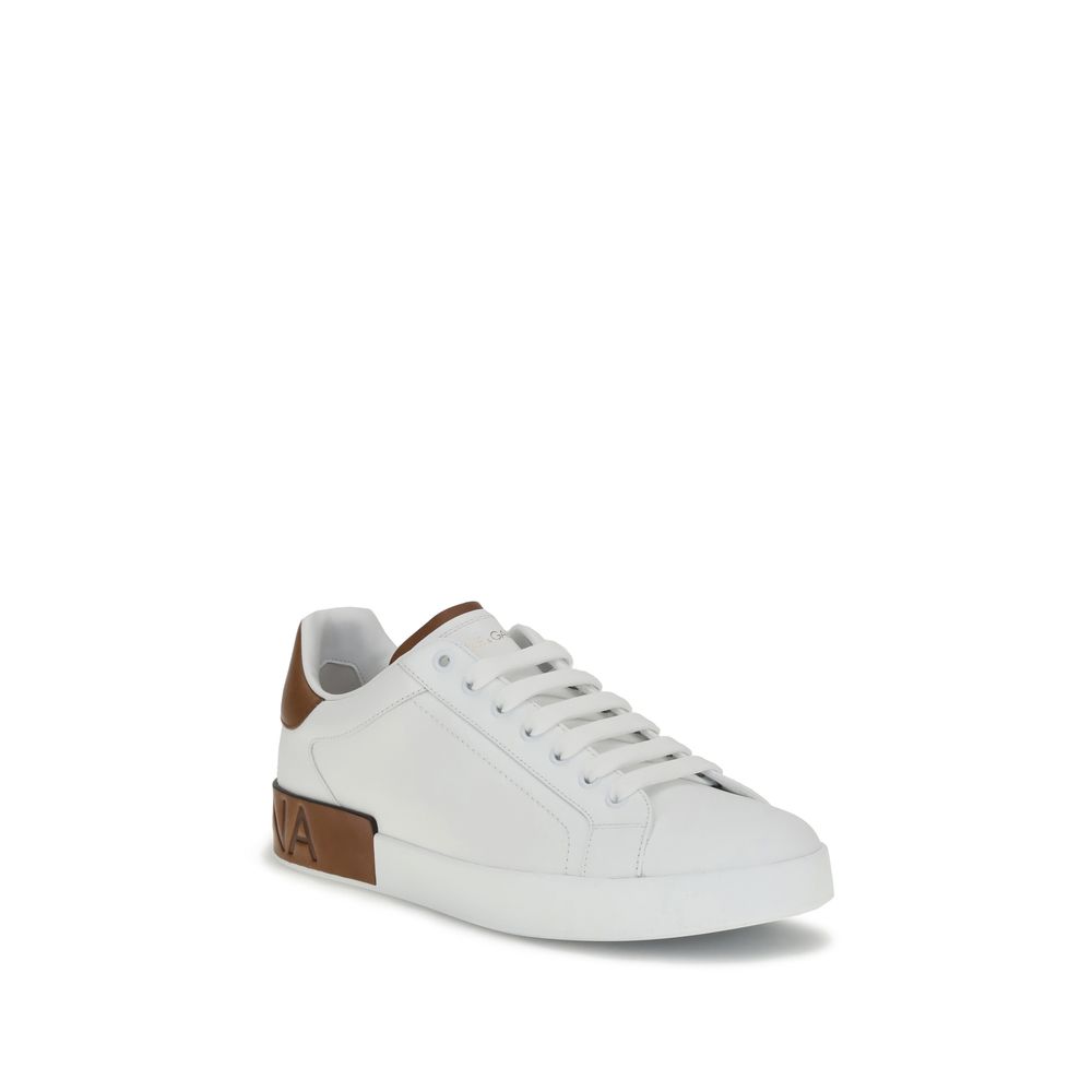 Dolce & Gabbana White Calf Leather Bos Taurus Low Top Sneakers with logo stripe and heel detail, showcasing classy casual style.