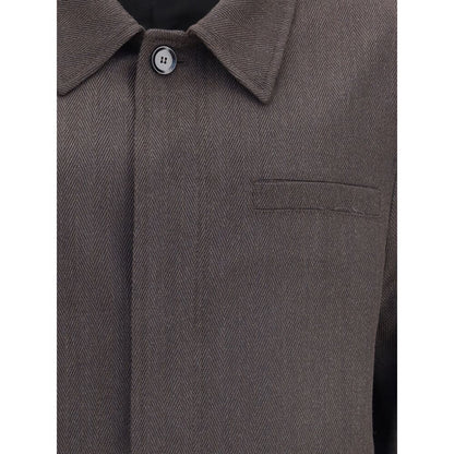Brioni Brown Wool Coat featuring herringbone fabric with classic collar and concealed button closure, elegant and sophisticated design.