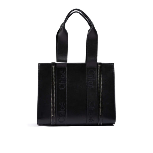 Chloé Black Woody Embroidered Logo Leather Medium Tote Bag with black embroidered logo and dual handles, made of premium leather.
