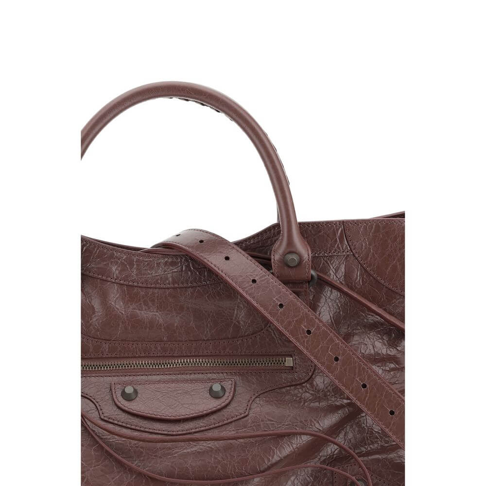 Balenciaga Brown Calf Leather Bos Taurus Shoulder Bag with woven handles and adjustable strap, showcasing elegant craftsmanship.