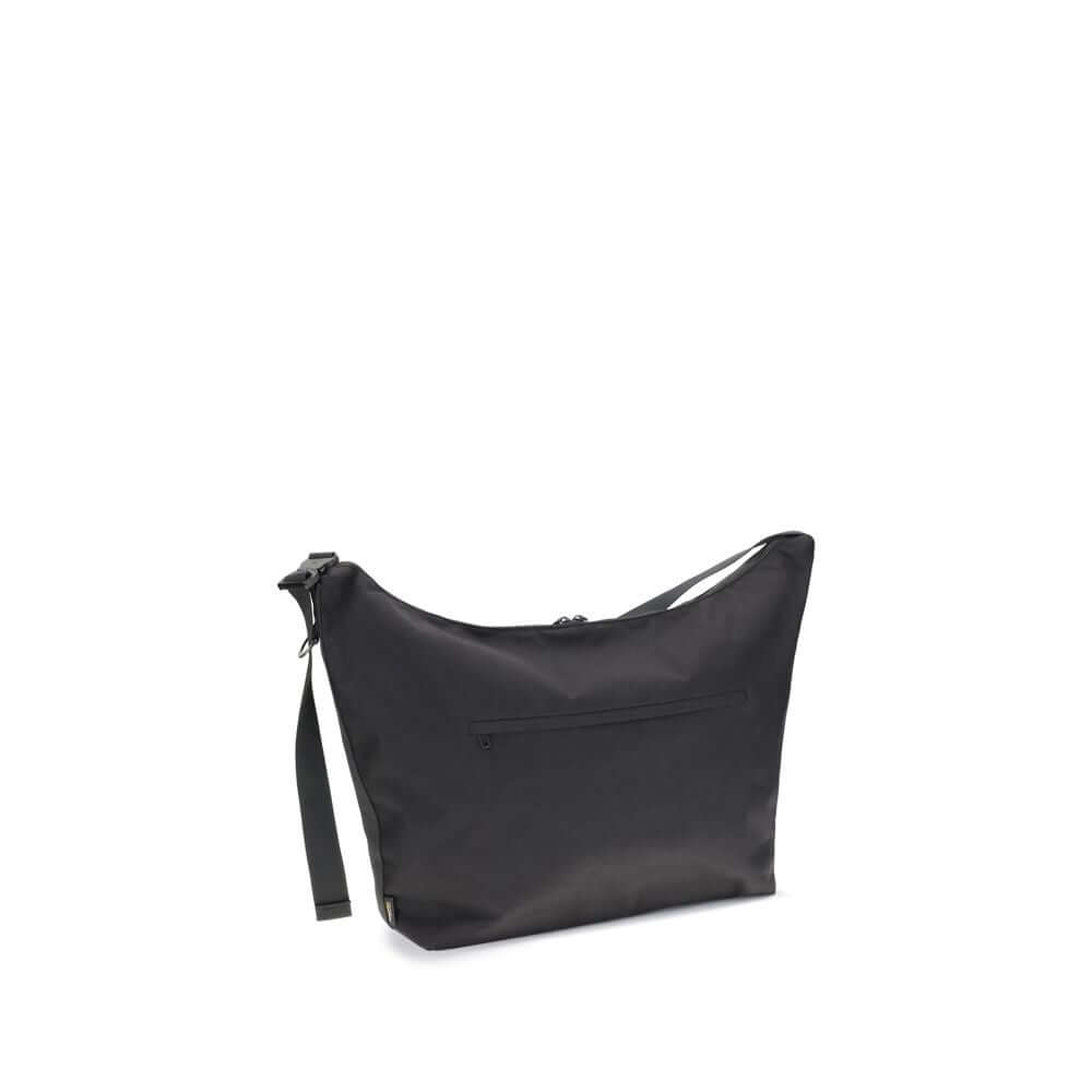 Front view with bag zipped and handles upright.
