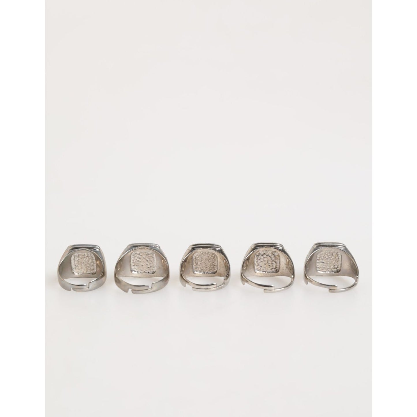 Dolce & Gabbana Silver Tone Brass Lettering Set 5 Pieces Adjustable Ring featuring bold initial design and polished finish.