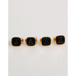 Dolce & Gabbana Gold Tone Brass JAZZ Letter Set 4 Pieces Adjustable Ring on display
