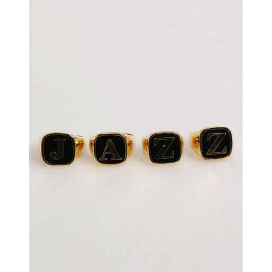 Dolce & Gabbana Gold Tone Brass JAZZ Letter Set 4 Pieces Adjustable Ring, featuring a luxurious design with gold-tone brass letters.