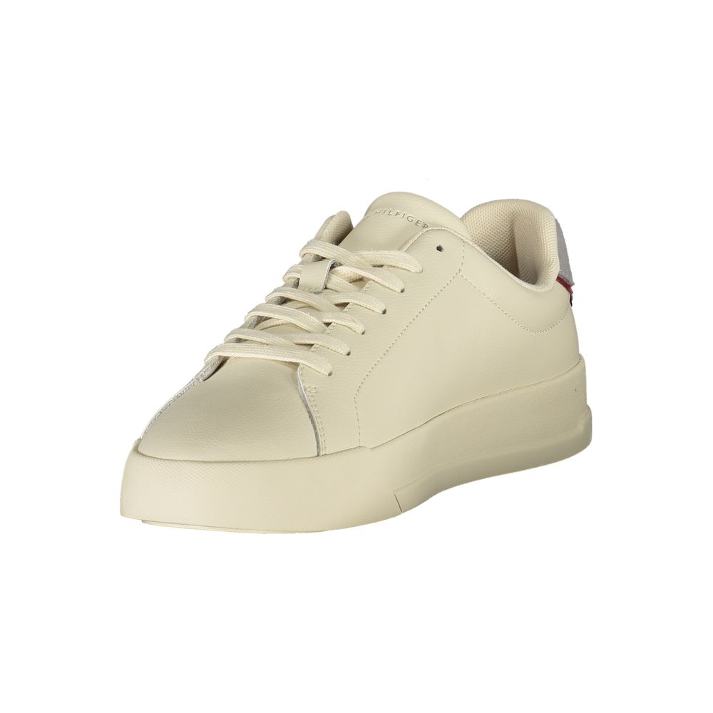 Tommy Hilfiger Beige Leather Men Sneaker with grey accents, featuring a sporty design and signature logo for modern luxury.