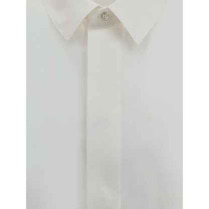 Saint Laurent White Cotton Dress Shirt with classic collar and concealed buttons, featuring embroidered logo for sophisticated style.